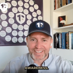 Coach Brandon Jenkins writes about being a strong team. Image is of a video still where Brandon is sitting in front of his Blueprint and bookshelf.